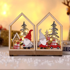 Set of two warm LED lighted wooden Christmas houses with gnomes and tree ornaments