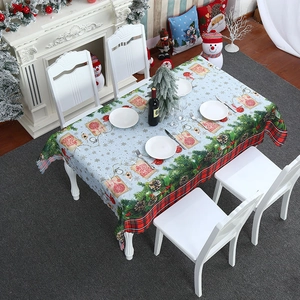 Festive Merry Christmas tablecloth with pine branches and red plaid border decor
