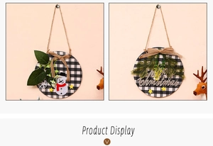 Detail of Christmas wooden door signs with black and white plaid and Merry Christmas text