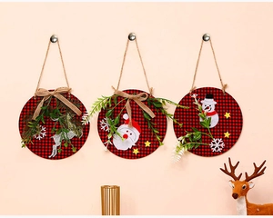 Three-piece buffalo plaid Christmas wall hangings featuring snowman and deer with burlap bows