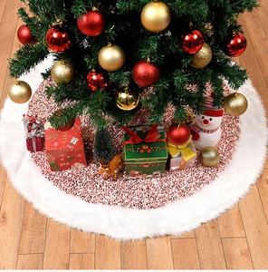 Detail of rose gold sequin Christmas tree skirt with plush white faux fur trim