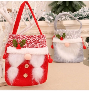Close-up of festive Christmas gift bags with gnome design and red berry details