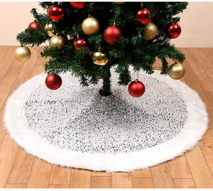 Detailed view of white faux fur Christmas tree skirt with shimmering silver sequins