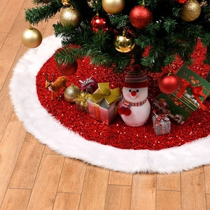 Sparkling red sequin Christmas tree skirt with plush white faux fur trim on wooden floor