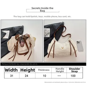 Tableau des tailles et guide de capacité pour ce sac cabas beige de style français moderne