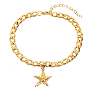 Gold stainless steel Cuban link anklet with detailed starfish pendant on white background