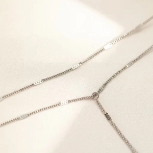Elegant Y-shaped stainless steel tassel necklace with minimalist silver double-layer chain