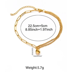 Vue détaillée de la chevillère dorée avec pendentif boule et dimensions