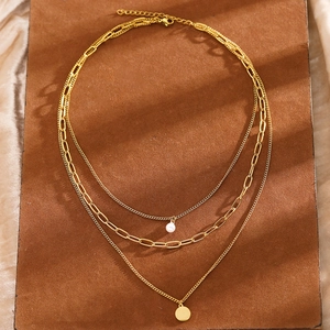 Three-layer gold stainless steel necklace with pearl and round disk pendants