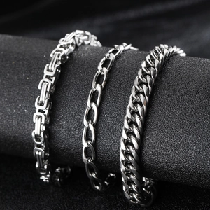 Men's silver stainless steel stackable bracelets with Byzantine and Cuban chain designs