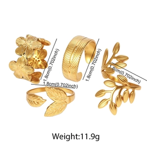 Detail of four-piece gold stainless steel leaf and flower adjustable rings set