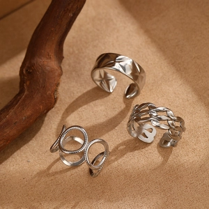 Three-piece silver stainless steel adjustable ring set with geometric and hollow designs