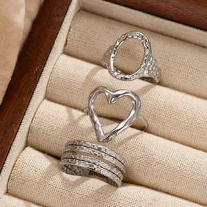 Three-piece silver stainless steel adjustable ring set with textured lava finish