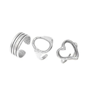 Three-piece set of adjustable stainless steel rings featuring heart and textured designs