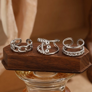 Three-piece silver stainless steel open ring set with woven Cuban chain texture