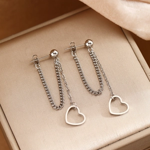 Minimalist stainless steel heart tassel earrings with long chains on velvet box