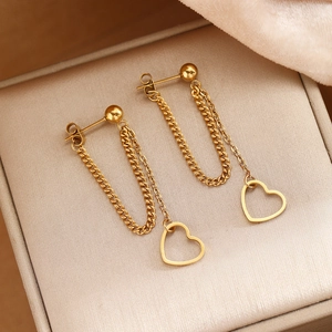 Elegant gold stainless steel drop earrings with hollow heart charms on delicate chains