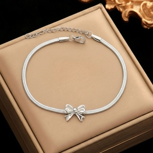 Silver butterfly charm snake bone anklet made of durable stainless steel with lobster clasp
