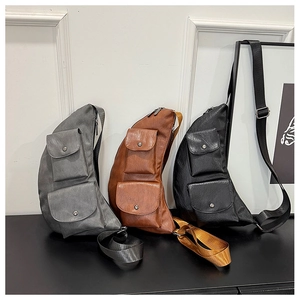 Three PU leather chest bags in gray, brown, and black with double snap pockets