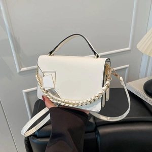 Elegant white crossbody bag with braided chain strap and minimalist metal lock