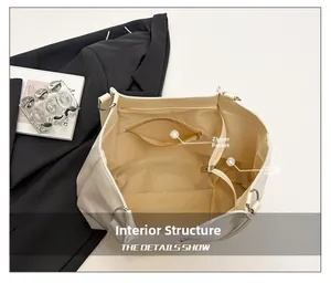 Interior view of large tote bag showing main compartment and inner zipper pocket