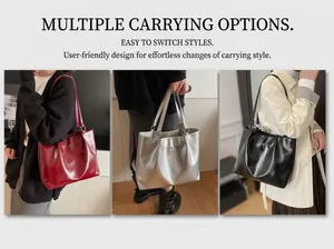 Three leather tote bags in red, silver and black with bow detail and versatile straps