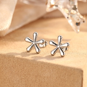 Elegant polished stainless steel flower earrings with a minimalist five-petal floral design