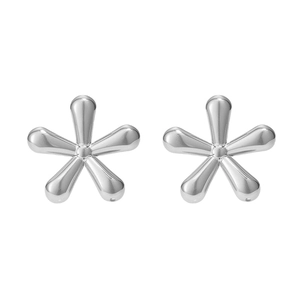 Macro detail of silver five-petal flower stud earrings with a high-polished mirror finish