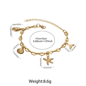 Detailed size chart of a golden ocean charm bracelet with starfish and shell pendants