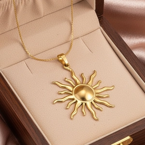Elegant gold stainless steel sunflower pendant necklace on champagne silk background
