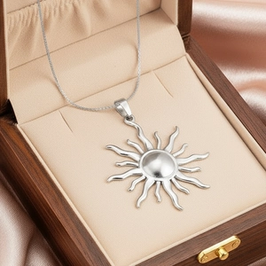 Sunflower pendant necklace in stainless steel displayed on a premium wood jewelry box