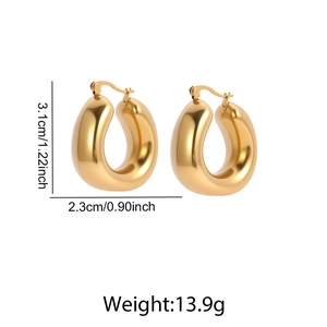 Detailed view of U-shaped gold earrings with dimensions 3.1cm height and 2.3cm width