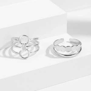 Minimalist double-layer hollow open silver rings set in a retro stainless steel style