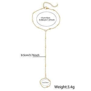 Vue détaillée du bracelet bague doré montrant les dimensions et le fermoir mousqueton
