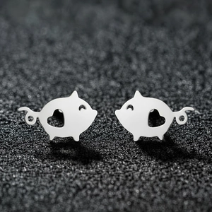 Minimalist hollow heart pig stud earrings in polished stainless steel for women