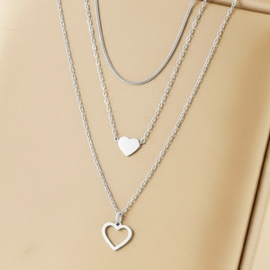 Three-layer stainless steel necklace featuring a snake chain and heart pendant set