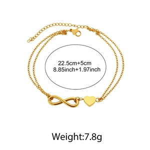Detailed view of double-layer gold anklet with infinity and heart charms measuring 22.5cm