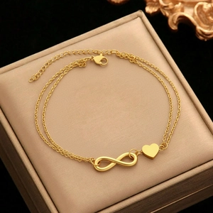 Double-layered golden stainless steel anklet with infinity symbol and heart pendant charms