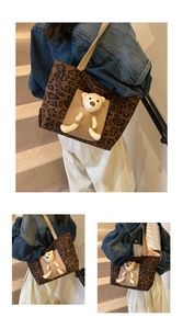 Detail of leopard print tote bag featuring a plush bear in the front pocket