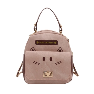 Mini pink and brown backpack with cute cartoon pig design and gold metal chain strap