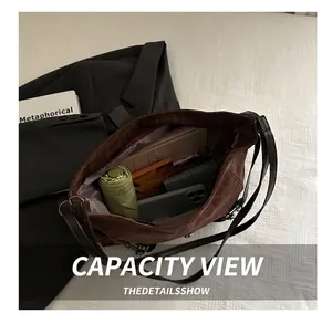 Brown vintage leather tote bag showing spacious interior with daily essentials storage