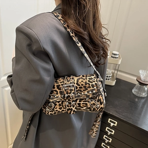 Chic leopard print shoulder bag with silver rivets and metal buckle in Y2K style
