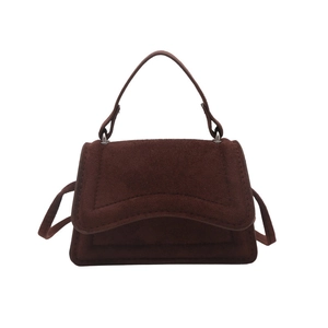 Deep brown suede crossbody bag with wave design and elegant matte finish