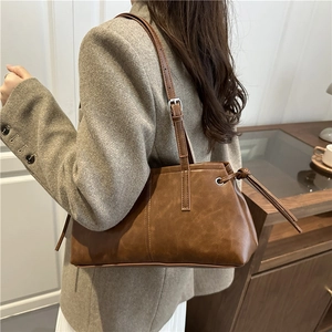 Retro brown PU leather tote bag with adjustable shoulder strap and knot details
