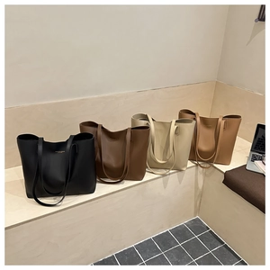 Minimalist leather tote bags in black, brown, cream and tan colors for daily commuting