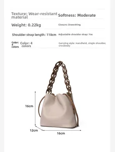 Detailed view of beige bucket bag showing dimensions, 0.22kg weight and adjustable strap