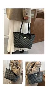 Detail of the vintage tote bag with M-letter print and gold metal clasp on shoulder