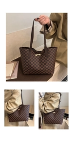 Macro detail of brown monogram tote bag showing PU leather texture and gold hardware