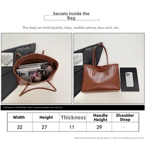 Tabella taglie dettagliata per borsa tote retrò: larghezza 32 cm e altezza 27 cm