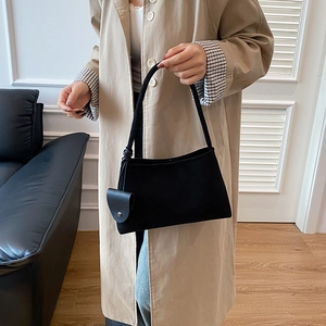 Minimalist black faux leather hobo bag with knotted strap and small purse accessory